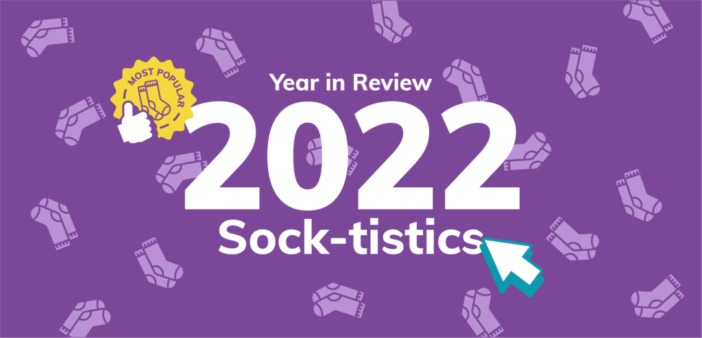 a purple background with white text and socks